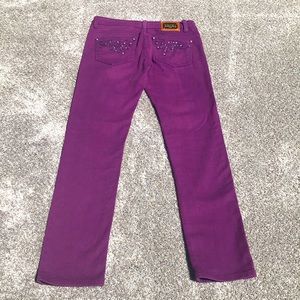 Grab these Dolce & Gabbana embellished jeans, stylish purple.